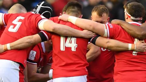 Wales players huddle