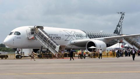 an Airbus A350 XWB commercial aircraft on static display during the Singapore Airshow