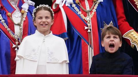 The Royal Family watches the flypast on the balcony