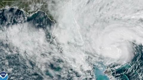 Satellite view of hurricane which has been downgraded to tropical storm