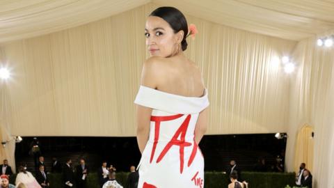 Congresswoman Alexandria Ocasio-Cortez wears a dress that read "TAX THE RICH" to the Met Gala in 2021