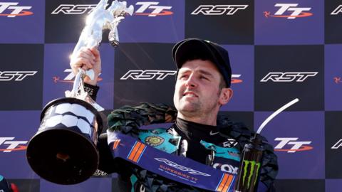 Michael Dunlop with the Superbike TT trophy