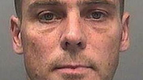 Custody photo of convicted killer Christopher Paul