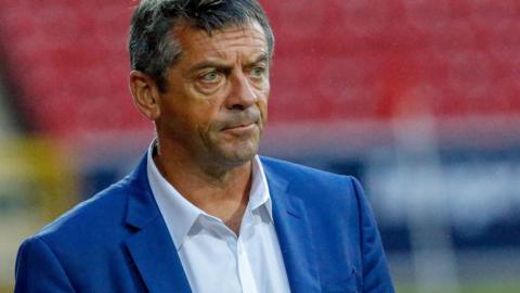 Phil Brown watches on