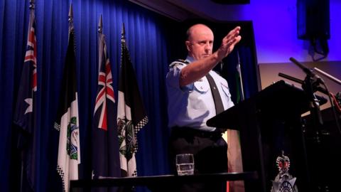 Australian Federal Police acting commissioner Neil Gaughan speaking at a press conference