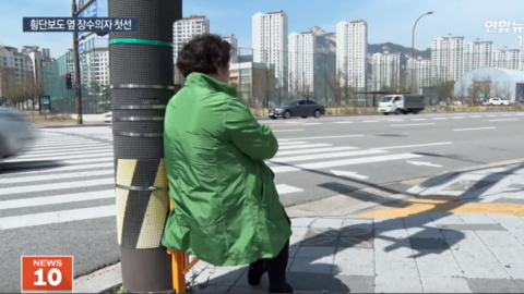 Chair for older pedestrians to rest at road crossings, Namyangju, South Korea