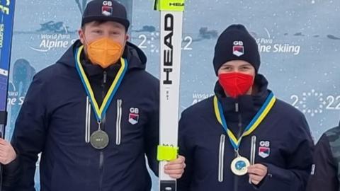 Millie Knight and Brett Wild on the podium