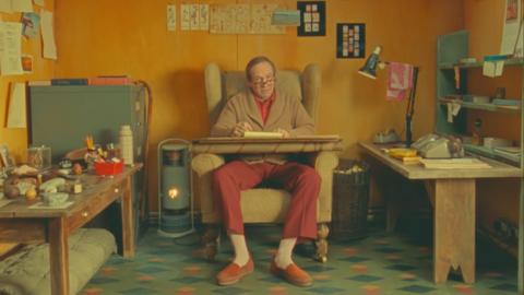Ralph Fiennes as Roald Dahl in his writing hut in the film