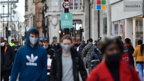 Shoppers in London last year