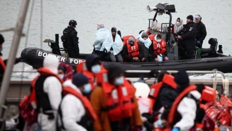 Border Force bring migrants to shore at Dover