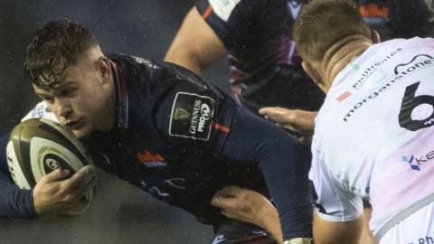 Edinburgh's Darcy Graham is tackled by Ollie Cracknell