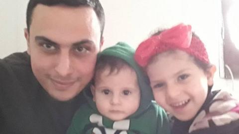 Ahmed Alnaouq with his nephew Abdullah and niece Sara