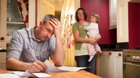 A family dealing with money problems