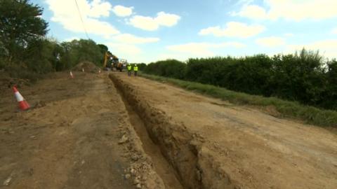 Image of the road that collapsed due to badger setts and tunnels under neath.