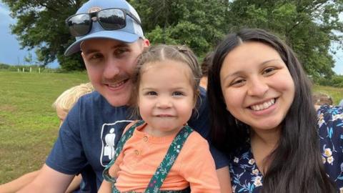 Paul Elmstrand with his wife Cindy and two-year-old daughter