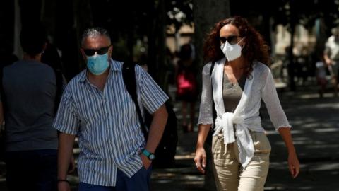 People wearing masks in Catalonia