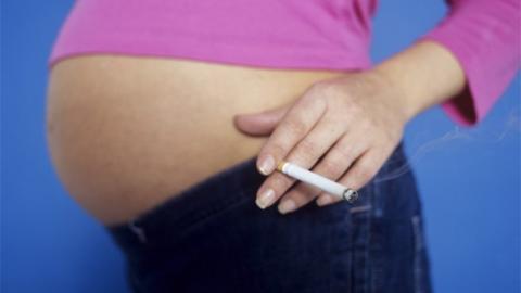 Pregnant woman smoking