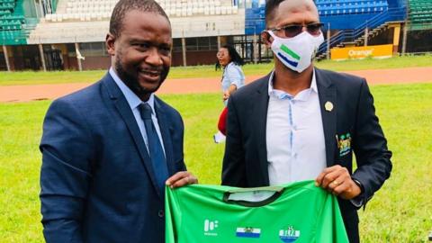 Sierra Leone coach John Keister Keister (left) being unveiled by sports minister Ibrahim Nyelenkeh