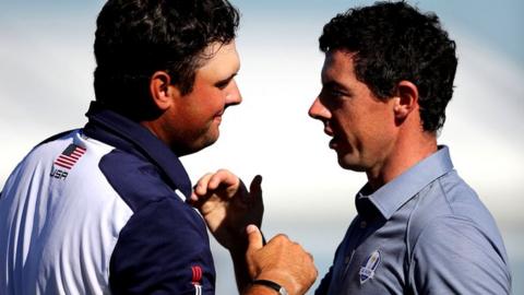 USA's Patrick Reed and Europe's Rory McIlroy shake hands