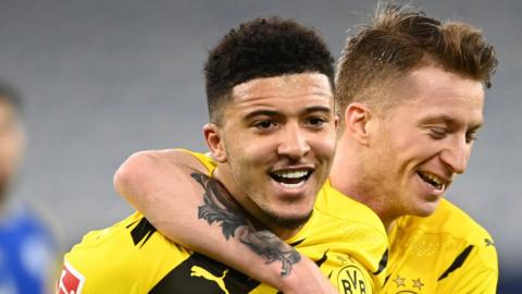 Jadon Sancho celebrates