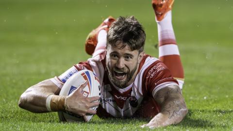 Ben Hellewell scores a try for Salford Red Devils