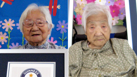 Umeno Sumiyama (L) and Koume Kodama with their official certificates