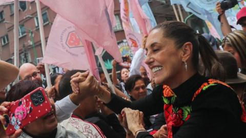 Former Mexico City Mayor Claudia Sheinbaum greets supporters during an event