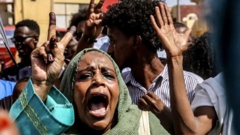 Woman shouts during anti-coup protests as a part of nationwide demonstrations after military took over the government on 25 October, in the capital Khartoum, Sudan, 30 October 2021
