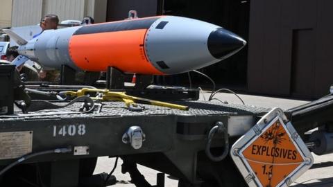 Thermonuclear bomb being loaded onto an aircraft