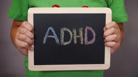 A sign reading 'ADHD'