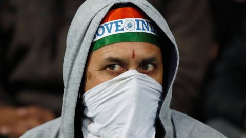 An India fan in a mask