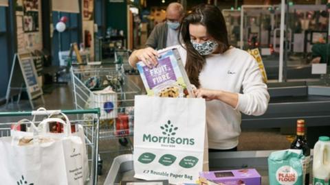 Woman bagging her shopping