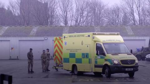 army helping ambulance service