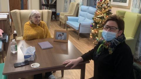 Jacqueline visiting her mother Eileen McGrugan in the care home