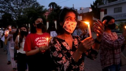 Indian activists protest against an alleged gang rape of a 19 years old Dalit girl in Uttar Pradesh state, in Bhopal, India, 01 October 2020.