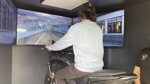 A rider using the motorbike simulator