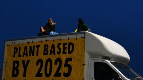 About 50 people from Animal Rebellion locked themselves on to barricades at the Arla site in Aylesbury, Buckinghamshire.