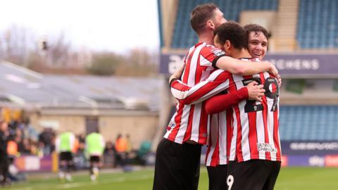 Millwall are knocked out of the FA Cup after falling 2-0 to Sheffield United in all-Championship clash.