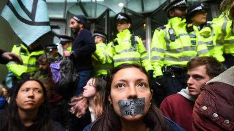 Police and Extinction Rebellion protestors