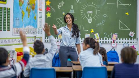 teacher-pupils-classroom.