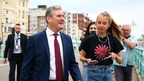 A climate activist doorsteps Keir Starmer