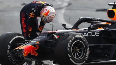 Max Verstappen looks dejected after crashing out in Baku