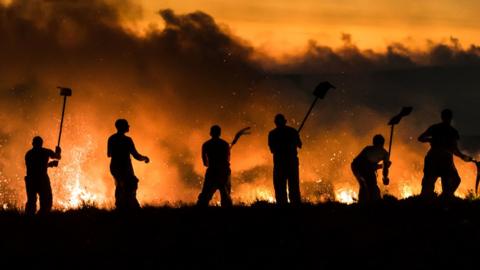 firefighters on moorland in 2018