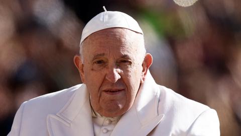 Pope Francis arrives for the weekly general audience in St. Peter's Square at the Vatican, March 29, 2023