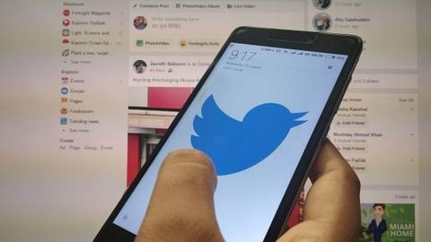 Twitter Logo can be seen On a Mobile Phone in India.