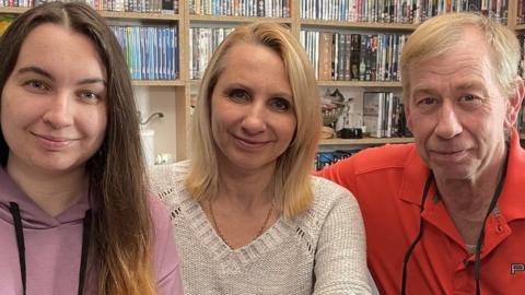 Robert Chesnaye with his wife Kateryna Rybalochka and step daughter Olena Rybalochka