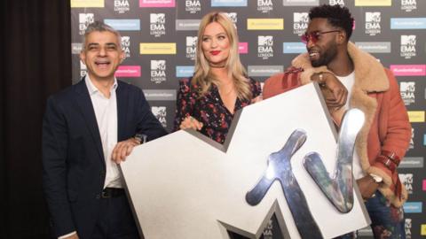 Mayor of London Sadiq Khan with MTV presenter Laura Whitmore and Tinie Tempah