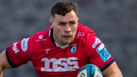 Mason Grady attacks for Cardiff