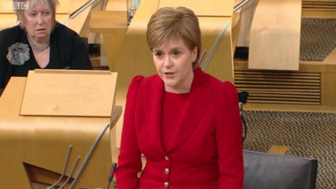 Nicola Sturgeon with Christine Grahame in the background