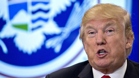 President Donald Trump speaks while touring the CBP National Targeting Center in Sterling, Virginia, 2 February 2018